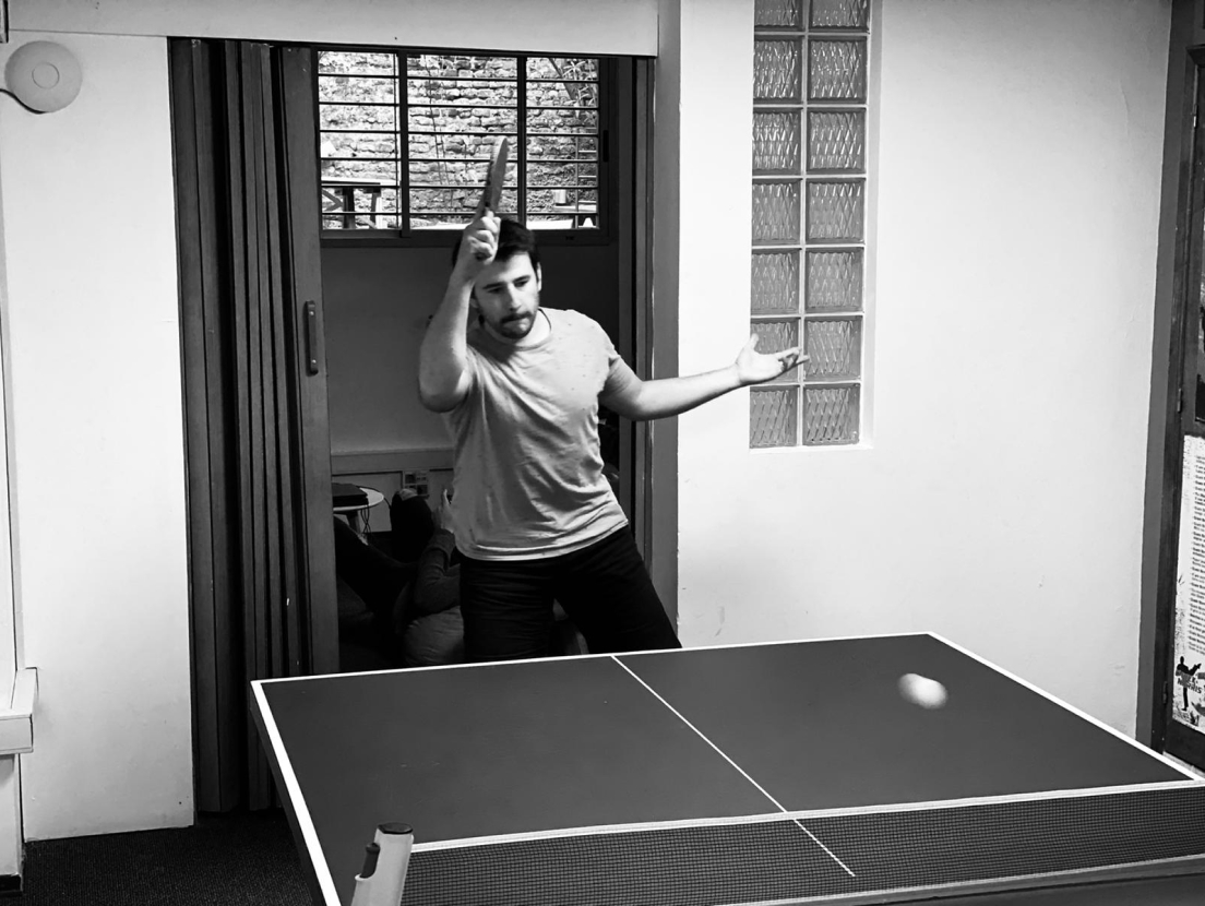 A man playing ping pong.